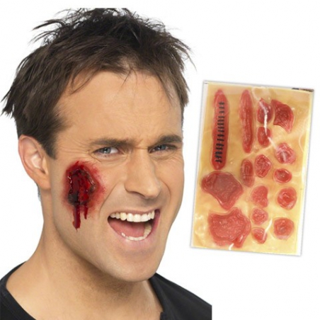 Kit de 12 cicatrices en latex pour réaliser vos maquillages de zombie Kit de 12 cicatrices en latex pour réaliser vos maquillages de zombie