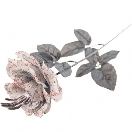 Rose blanche en tissu avec main squelette, un article de décoration original pour halloween Rose blanche en tissu avec main squelette, un article de décoration original pour halloween