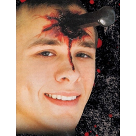 Prothèse en latex pieu planté dans la tête - maquillage halloween Prothèse en latex pieu planté dans la tête - maquillage halloween