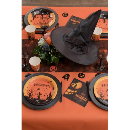 Idée de décoration de table pour halloween avec la nappe orange airlaid